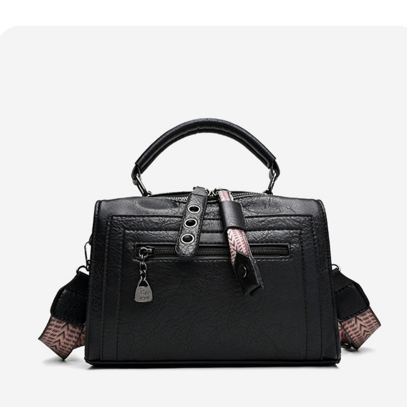 ボストンスタイルのしっかりとした構造のハンドバッグ。トップハ - Structured Handbag Top Handle のレビューと価格